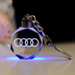 Llavero con logotipo automovilístico en 3D de cristal